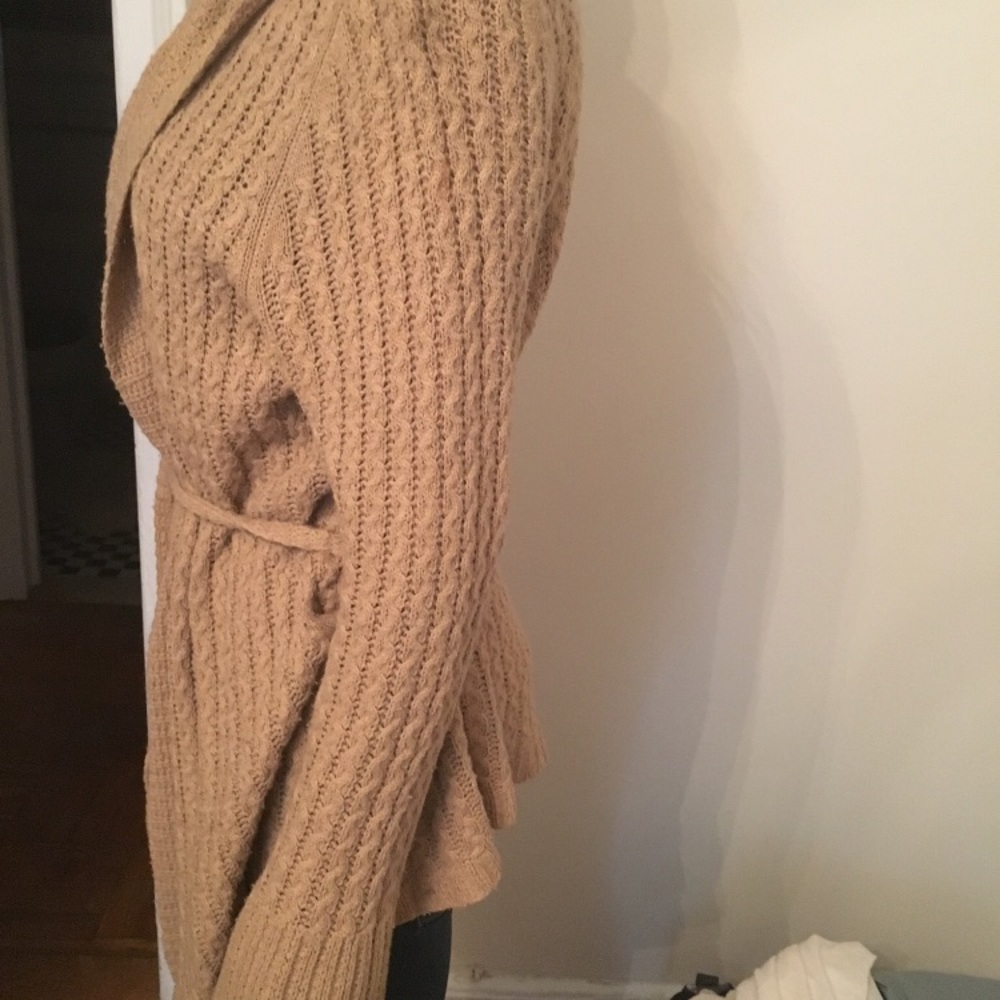 Cable-stitch tie front cardigan sweater.